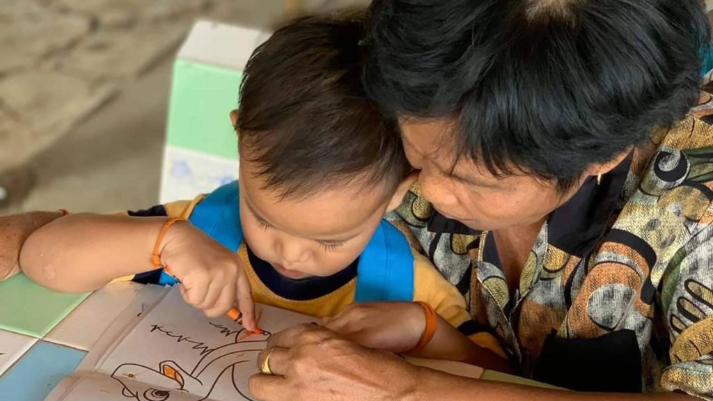 little boy with foster mother