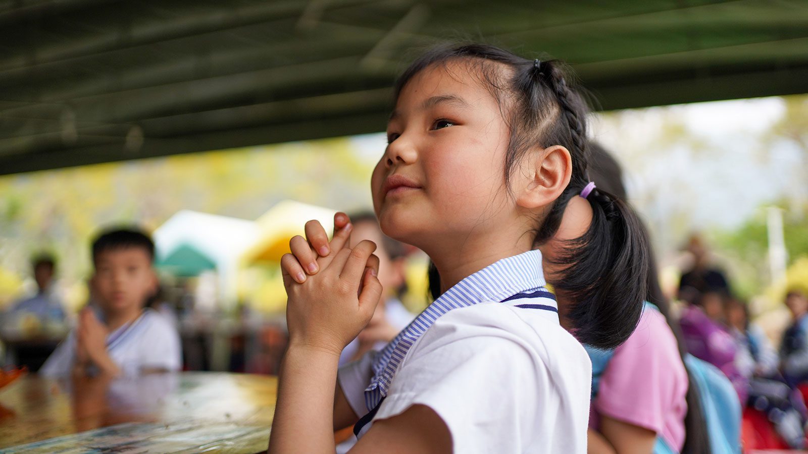 Stock image of a school-age girl in China