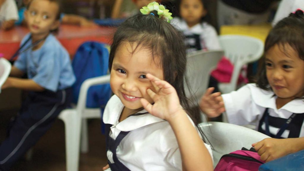 preschool aged girl in class