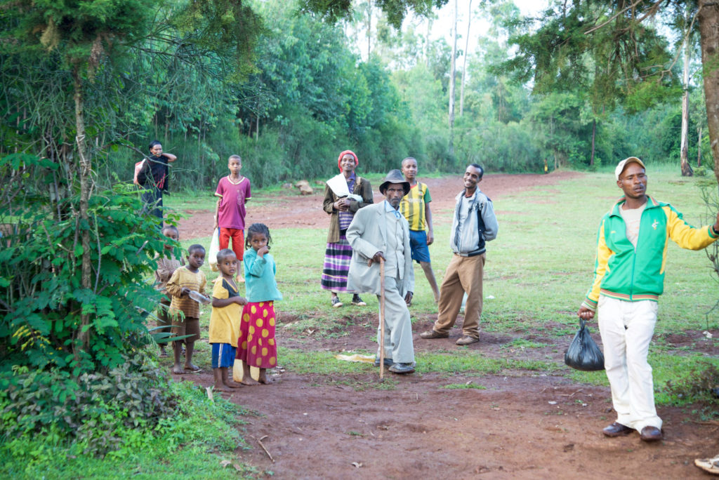 People gather to greet us as we visit families in this village. Through the years, Holt donors have given many GIfts of Hope to families and children in this community. 