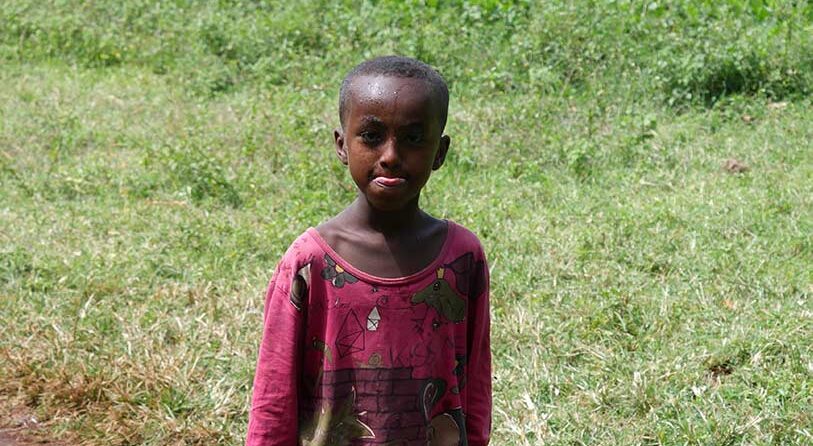 A boy walks in Ethiopia, medical care