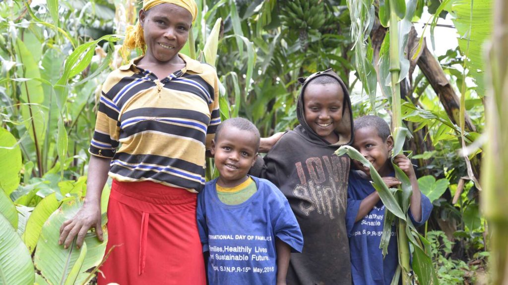 Four Ethiopian Children Smiling for Photo