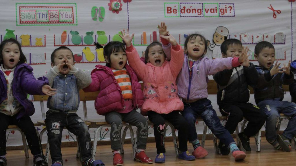 children playing in classroom